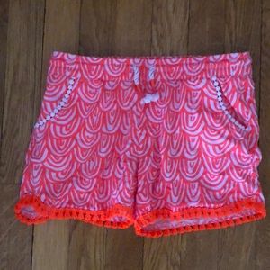 Children’s orange and white shorts